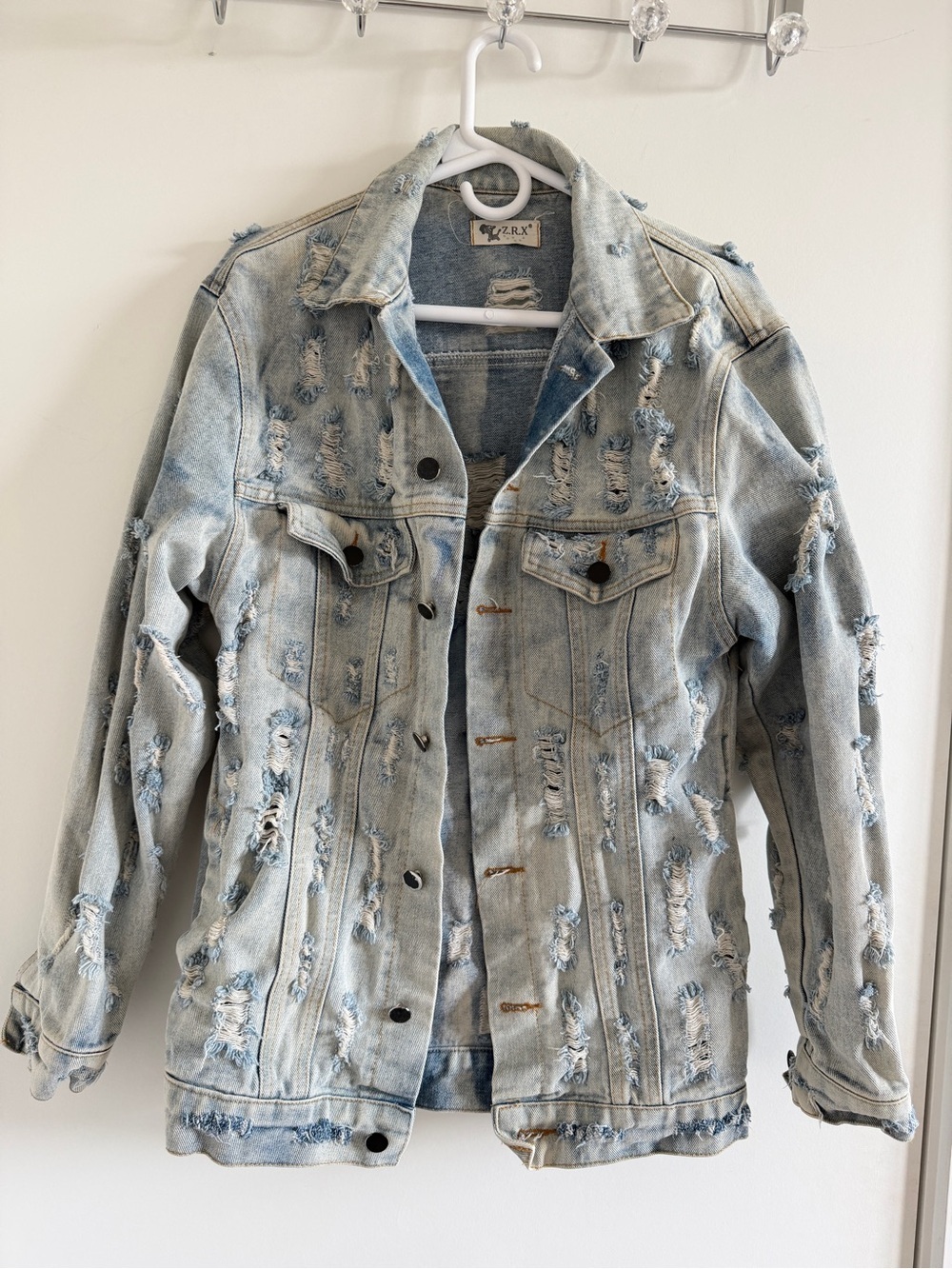 Distressed Light Wash Denim Jacket - Women's Light Blue